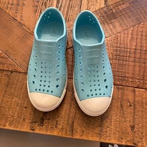 Iridescent blue color native shoes
